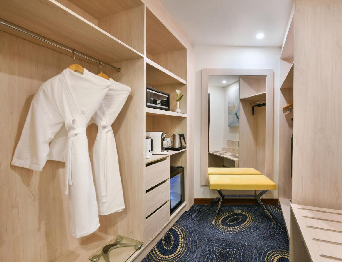 Tolip Gardens Hotel Каир Экстерьер фото A room at the hotel